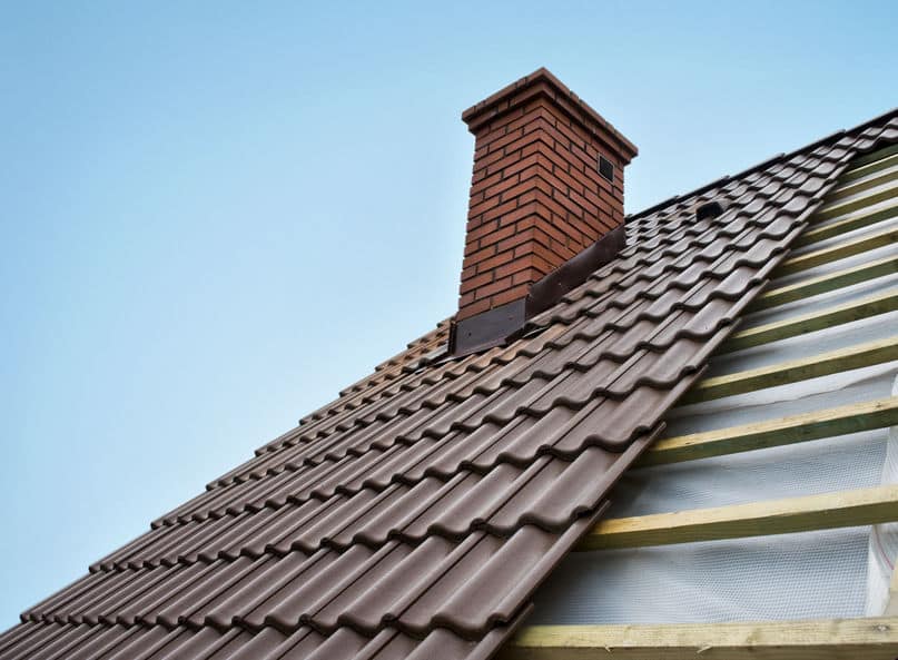 Picture of red brick chimney.