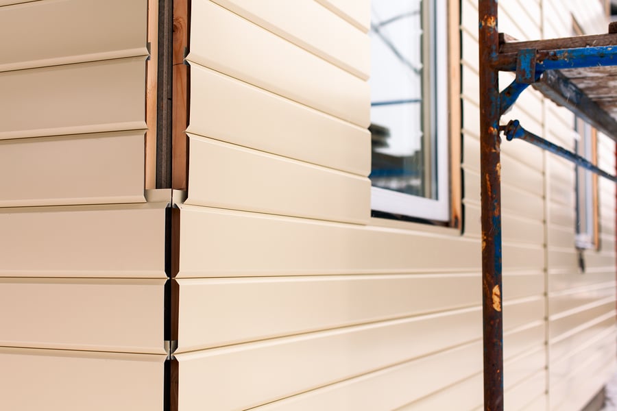 Picture of beige steel siding.