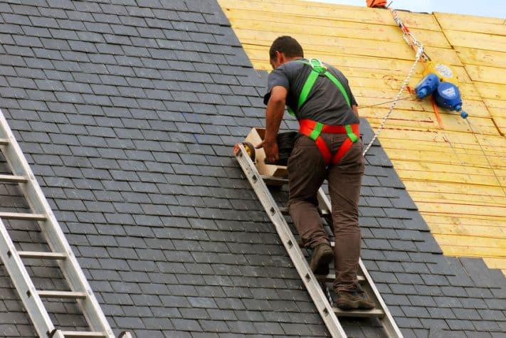 Picture of contractor working on roof.