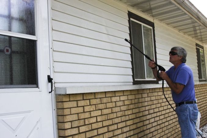 Picture of power washing siding.