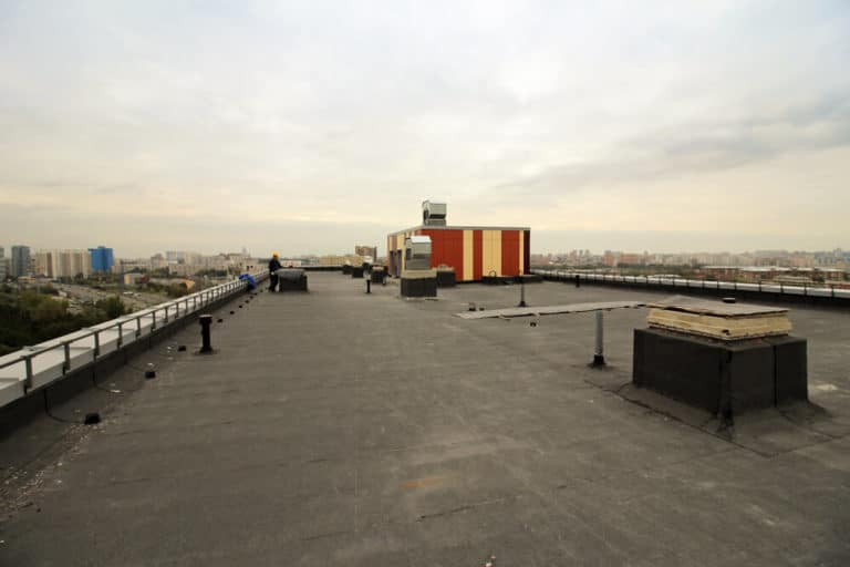 Why Do Commercial Buildings Have Flat Roofs? Perfect Exteriors