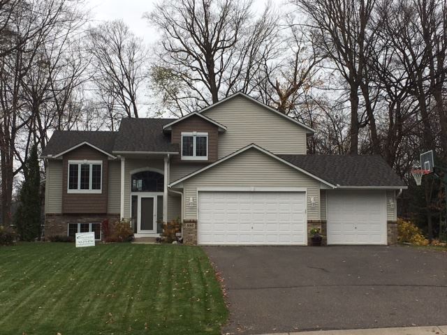 Image of house showing Perfect Exteriors of Minnesota roofing repair.